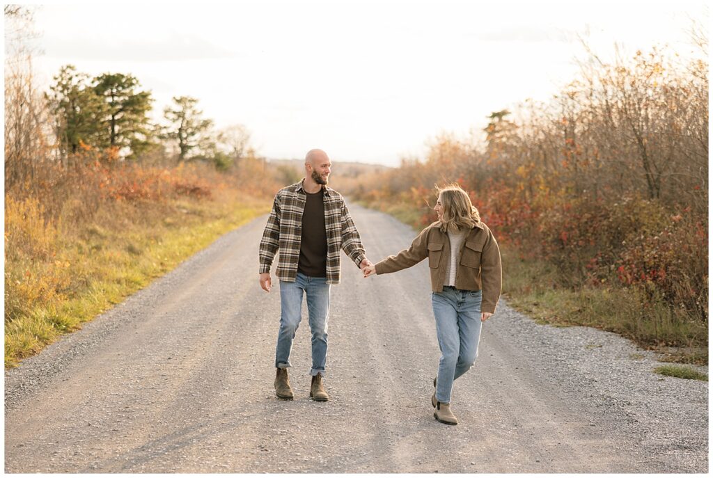Photo of couple running towards camera
