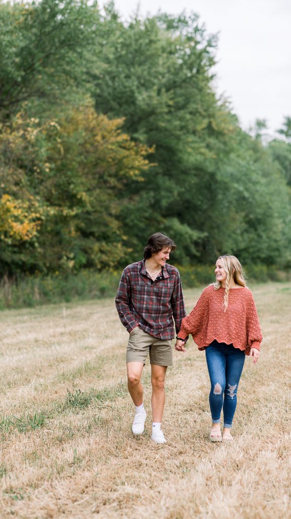 pa couples session by a stream in a field cornfield session