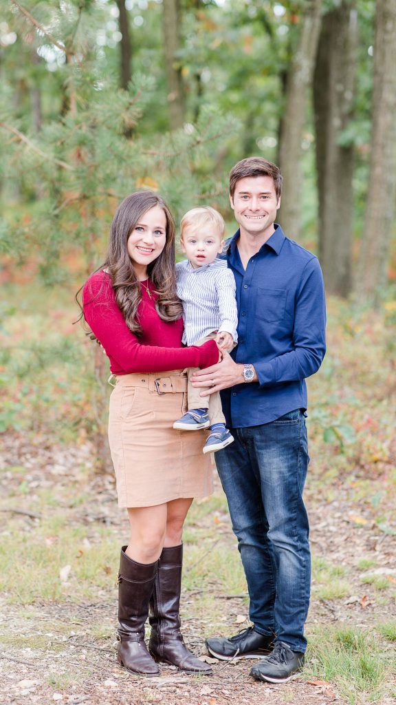 family session in the woods with fall leaves